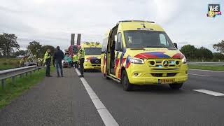 Vrouw gered uit over de kop geslagen auto op A2 bij Weert [upl. by Priscella]