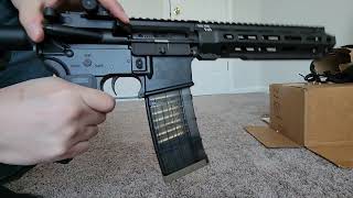 Airsoft Modified Rare Arms AR15 With Translucent Mag and Real 556 Casings [upl. by Ammeg]