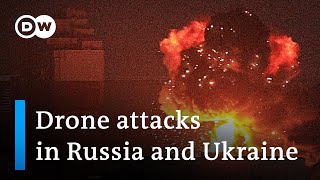 Ukrainian drone strikes damage military planes in Russia strikes on Kyiv kill at least 2  DW News [upl. by Borchers781]