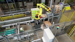 Tymbark MASPEX  palletizing mixing and depaletizing process with Fanuc robots [upl. by Evot]