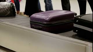 people are waiting for luggage at the airport baggage claim conveyor belt traveling [upl. by Einavoj537]