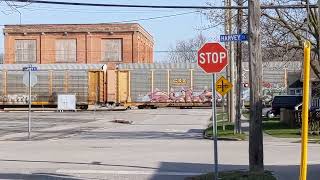 CP 234 autorack train with BNSF 7718 passes Downtown Chatham April 23 2022 [upl. by Asserak709]