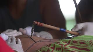 Samoan hand tap tattooing in slow motion [upl. by Attenwahs190]