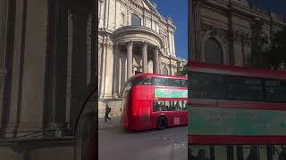 Double Decker buses in front of St Paul’s Cathedral [upl. by Parish]