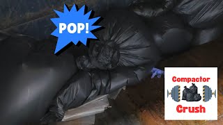 Trash compactor crushing and popping black bags [upl. by Tiffani]