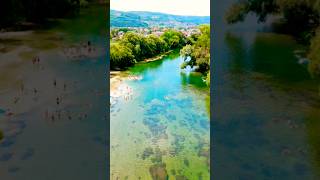 quotDrone Soars Over Crystal Clear Emerald River with Swimmers Below  Natures Paradisequot 🍀🏞 [upl. by Anniahs512]