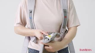 BABYBJÖRN  How to adjust the size on Baby Carrier Mini [upl. by Lepley]