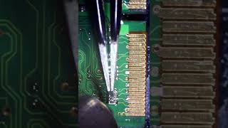 SMD Soldering electronicsrepair ic repair repairs electronics satisfyingvideo [upl. by Assila]