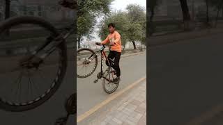 Mtb stunts riding one wheeling mtbstunt youtubeshorts viral📉📉100k views subscribe for more [upl. by Aelgna]