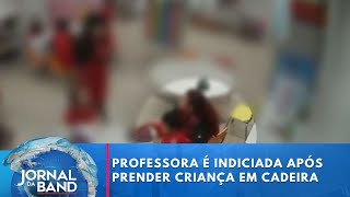 Professora é indiciada pela polícia após prender criança em cadeira com fita  Jornal da Band [upl. by Kaden]