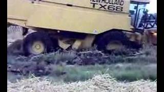 New holland Tx 68 4wd combine stuck 24 feet header shorts [upl. by Aohsoj]