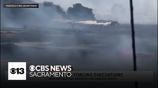 Manteca grass fire forces evacuations [upl. by Etnahc943]