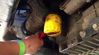 Removing A Stuck Oil Filter [upl. by Carce]