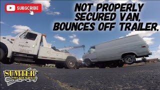 Not properly secured van bounces off trailer [upl. by Akcir]