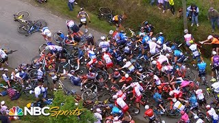 Fan with sign causes huge pileup in Stage 1 of the Tour de France  Cycling on NBCSports [upl. by Shishko]