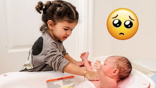 Toddler Gives Newborn Baby His First Bath adorable [upl. by Poland]