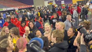 Iowa women celebrate NWCA National Duals title [upl. by Kcirrem]