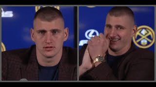 Nikola Jokic tries to keep it together after a camerawoman fell off her chair [upl. by Blood]