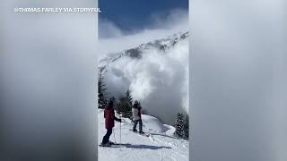 Massive avalanche tumbles toward skiers at resort [upl. by Clower797]