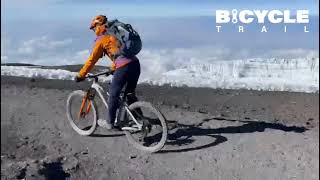 Conquering Mt Kilimanjaro By Bike  Pedaling The Majestic Free standing mountain summit by MTB Bike [upl. by Llezniuq]