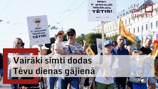 Vairāki simti dodas Tēvu dienas gājienā [upl. by Stout]