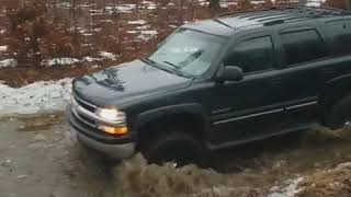 Lifted Tahoe on 35s vs mud hole [upl. by Grete]