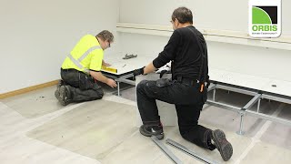 Installation of a raised floor in the Orbis showroom [upl. by Aihsad]