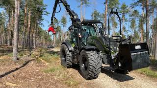 Valtra tractor equipped with Nisula 500H harvester head [upl. by Aryk]