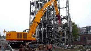 160 tonne excavator cuts 20 tonne tower [upl. by Ehcadroj]