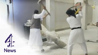 Islamic State fighters smash historic statues in Mosul  Channel 4 News [upl. by Etnoval652]