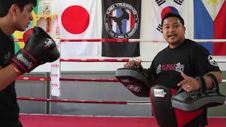 KRU Muay Thai Tip of the Week  Basic Thai Pad Holding Pt 1 [upl. by Maryjane]