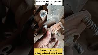 How to open alloy wheel stock nutHonda Amaze wheel nut problemlug nutAlloy stuck wheel nut remove [upl. by Nnylassej]