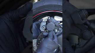 THE EASIEST REAR MOTORCYCLE BRAKE PAD SWAP [upl. by Shiau490]