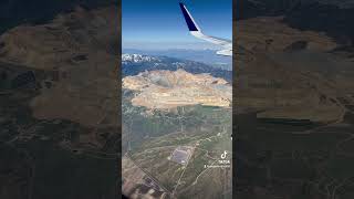 Flying over the largest manmade excavation and deepest open pit mine in the world in Utah [upl. by Atikin]