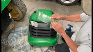 How to remove amp clean your dirty Headlight Lens on a John Deere L110 L120 L130 [upl. by Sakmar]