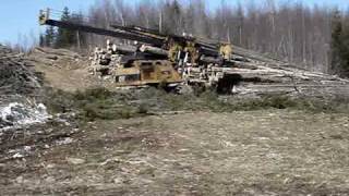 Cat 320C Propac Delimber and Deere 748G Skidder [upl. by Davy86]