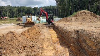 Digging Footings Flooding Rains Add To Culvert Upgrades [upl. by Nylkaj]