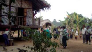 Rice Pounding  a Naga Village on Chindwin river Nagaland Myanmar [upl. by Atarman]