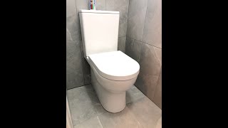 Rimless toilet installation back to wall [upl. by Vassar]