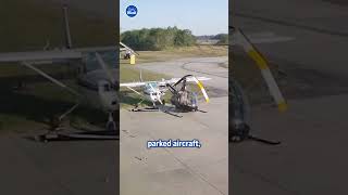 Helicopter spins out of control crashing into plane [upl. by Eibbob]