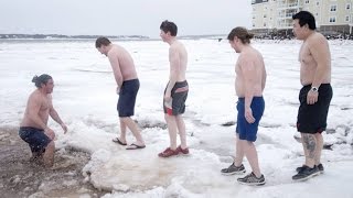 Canadians brave cold waters for polar bear dip [upl. by Glinys156]