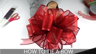 How to Make a Christmas Bow  Easiest BowMaking Method [upl. by Ivanna]