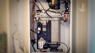 How to service an Ideal logic HE15 gas boiler [upl. by Macfadyn]