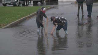 City crews and community work to clear clogged drains [upl. by Nylirret527]