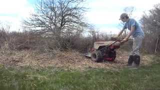 Gravely Model L8 with 26quot carbide tipped circular saw cutting down brush [upl. by Etnoel534]