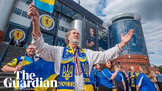 Ukraine and Scottish fans sing the Ukrainian anthem on the steps of Hampden ahead of final [upl. by Haakon]