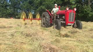 Massey Ferguson 35x turning hay [upl. by Aryc]