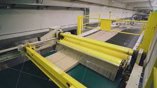 Corrugated cardboard moves along the conveyor belt and is automatically stacked [upl. by Pedaias]