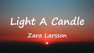 Zara Larsson  Light A Candle Lyrics Video [upl. by Nosnah]