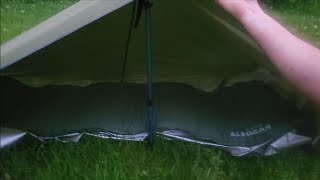 Unigear 10x10 solo camping offgrid improvised tarp shelter with floor 5 stakes amp hiking stick [upl. by Nelyag]